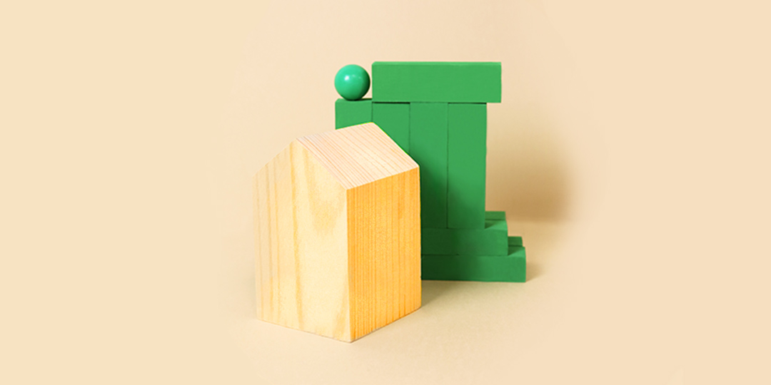 house and green blocks 