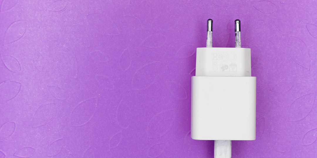 white plug on purple background