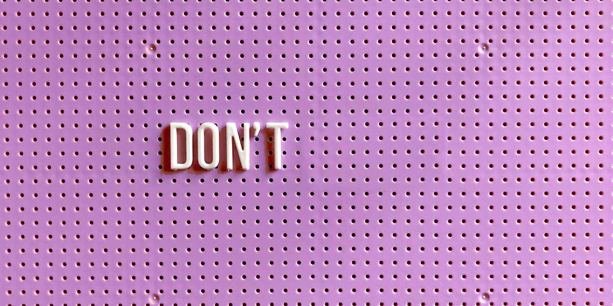 Don't spelled out on pink background
