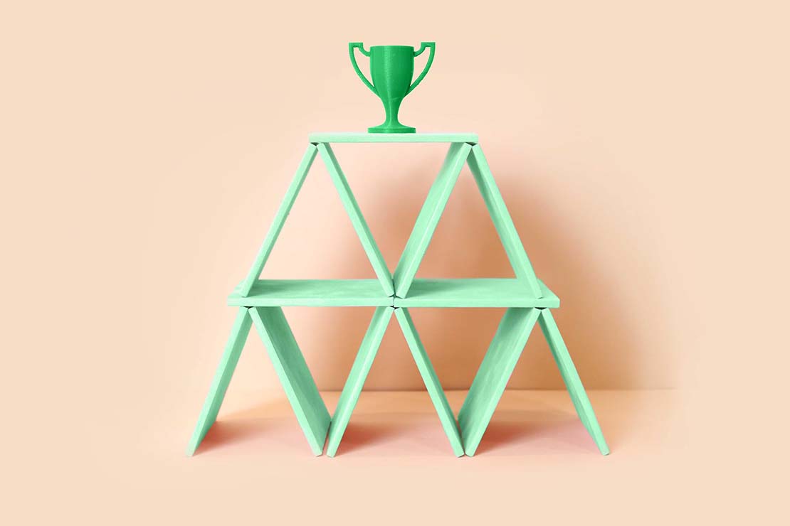 trophy on green blocks