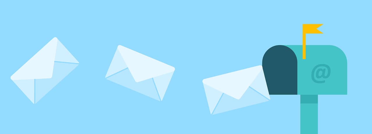 Envelopes entering a mailbox